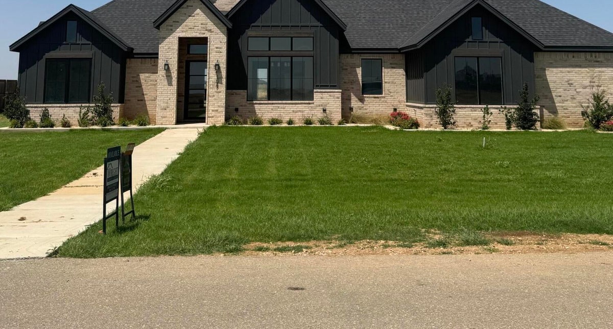 Front exterior of 1087 Deuce of Hearts near New Home